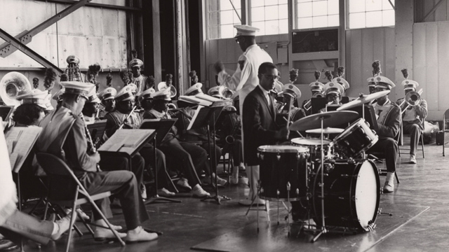 Wilson directing the Jones Marching Tiger Band at band practice.